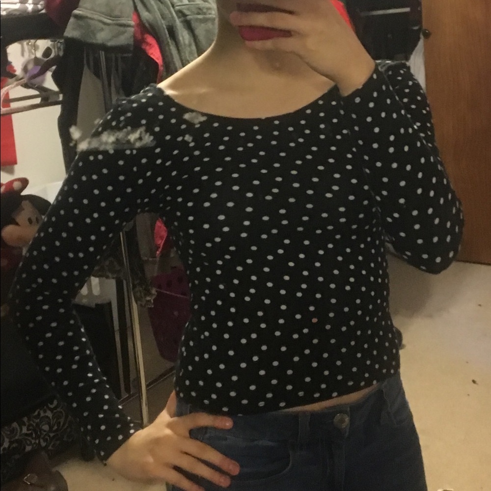 Polka Dotted 3/4 top with low cut back.
